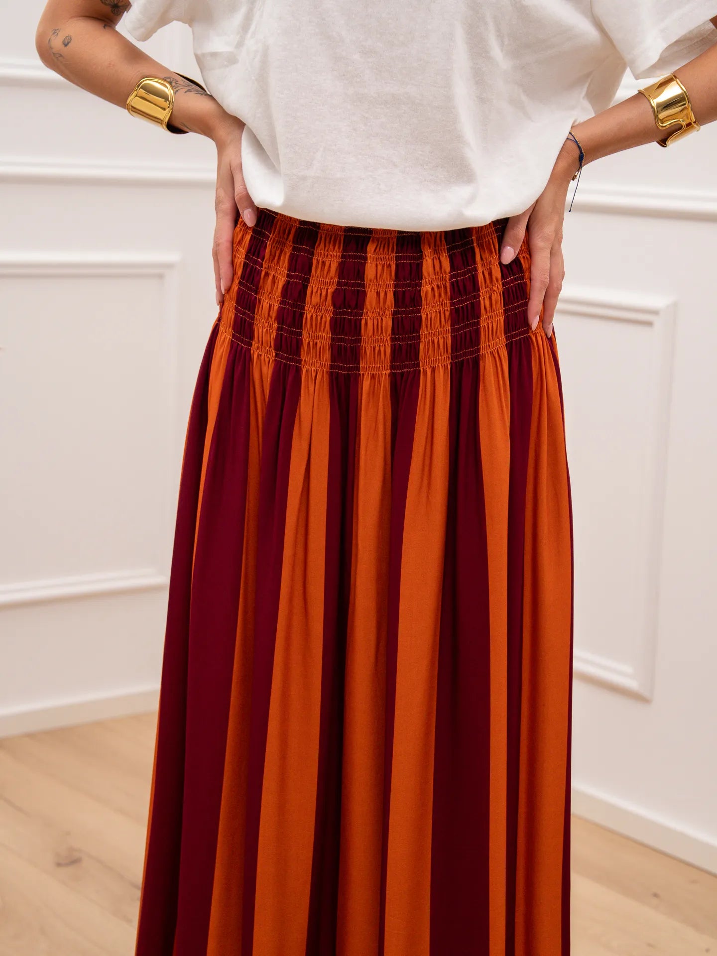Gonna maxi riga arancio e india punto smock in vita - Tensione In