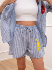 Shorts gessato celeste e blu patch Sole - Vicolo