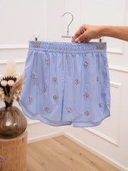 Shorts Shine rigati celesti con cabochon - Tensione In