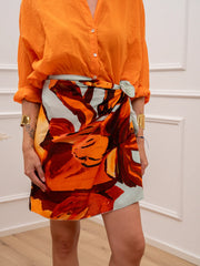 Gonna pareo mini con maxi fiore acqua e arancio - Tensione In