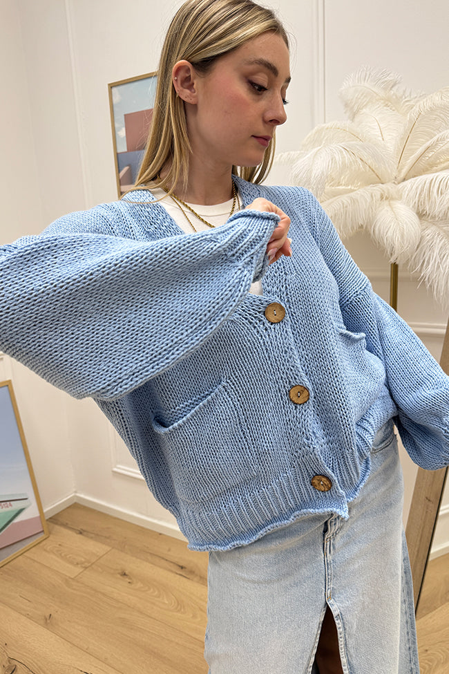 Cardigan corto celeste con taschine - HaveOne