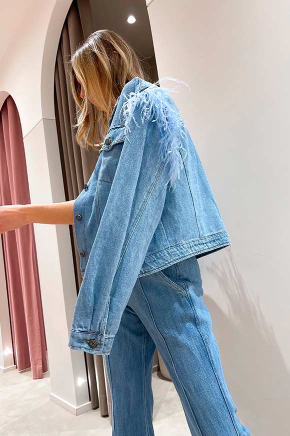 Tensione In - Light wash denim jacket with feathers on the shoulders