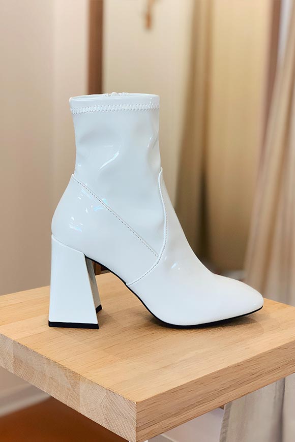 white patent leather ankle boots