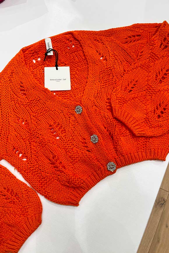 Tensione In - Cardigan arancio traforato con bottoni gioiello